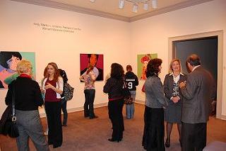 Guests at the opening of the Andy Warhol Exhibit in the Riderhoff Martin Gallery